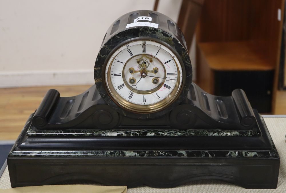 A Victorian black slate clock